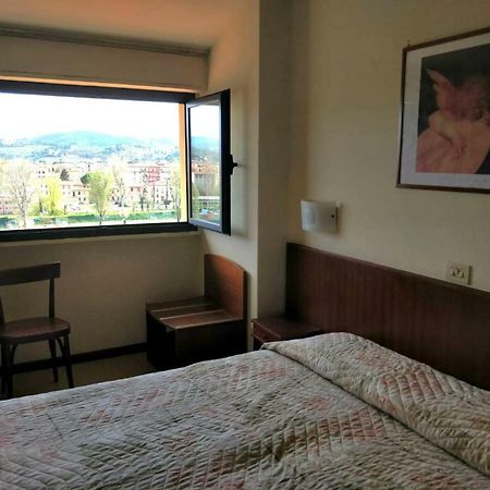 Columbus Urban Resort Флоренция Экстерьер фото A room at the hotel