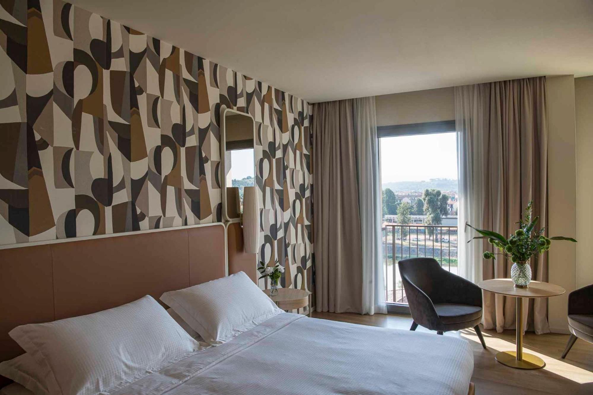 Columbus Urban Resort Флоренция Экстерьер фото A room at the hotel