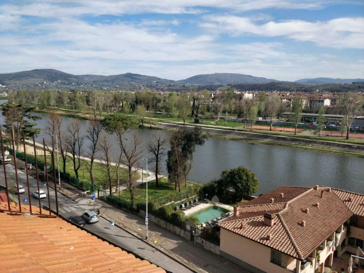 Columbus Urban Resort Флоренция Экстерьер фото The river Arno near Pistoia